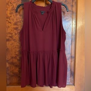 Ann Taylor sleeveless peplum top, size medium.
